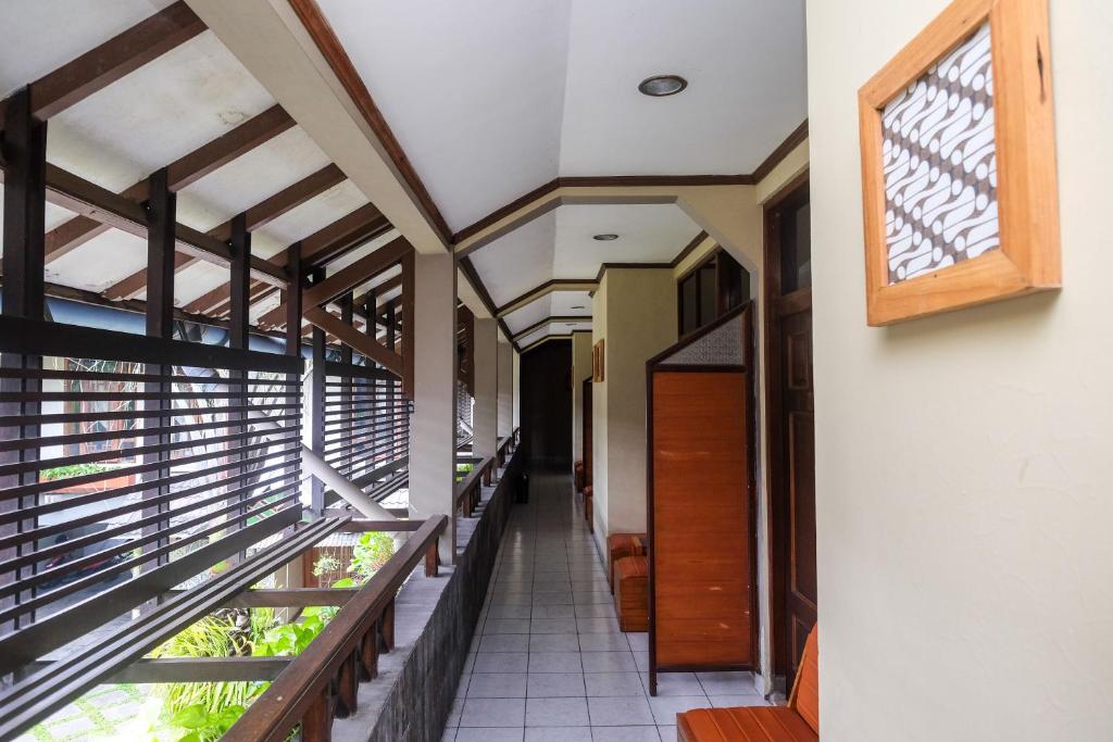 Fotografija v galeriji nastanitve Urbanview Hotel Syariah Wisnugraha by RedDoorz v mestu Yogyakarta