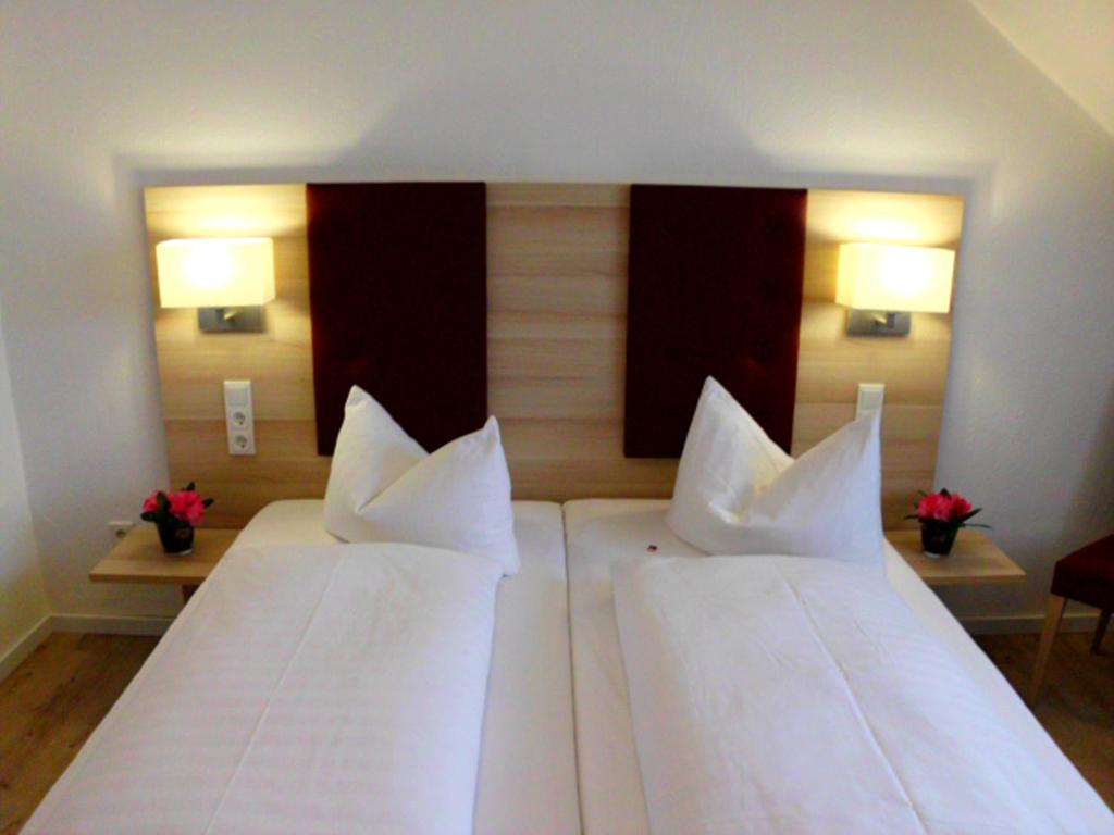 Postel nebo postele na pokoji v ubytování Hotel Zur Traube