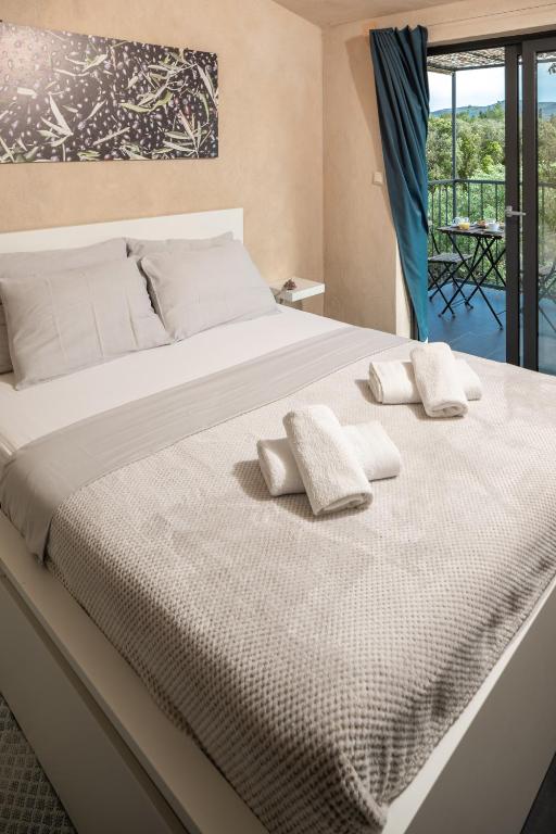 Postel nebo postele na pokoji v ubytování Mai's Villa
