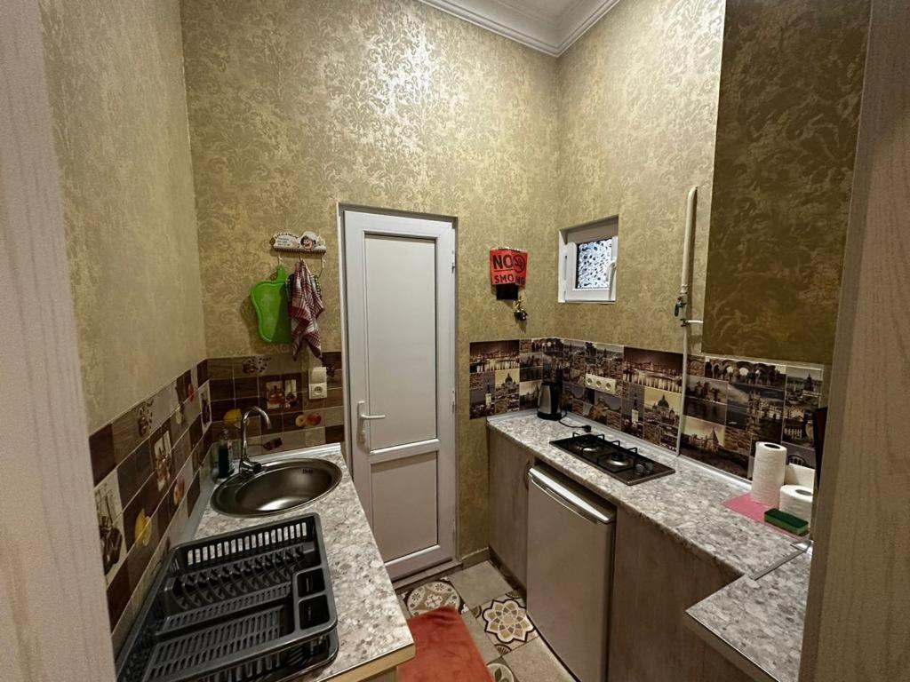 Kuchyň nebo kuchyňský kout v ubytování STEPROOMS