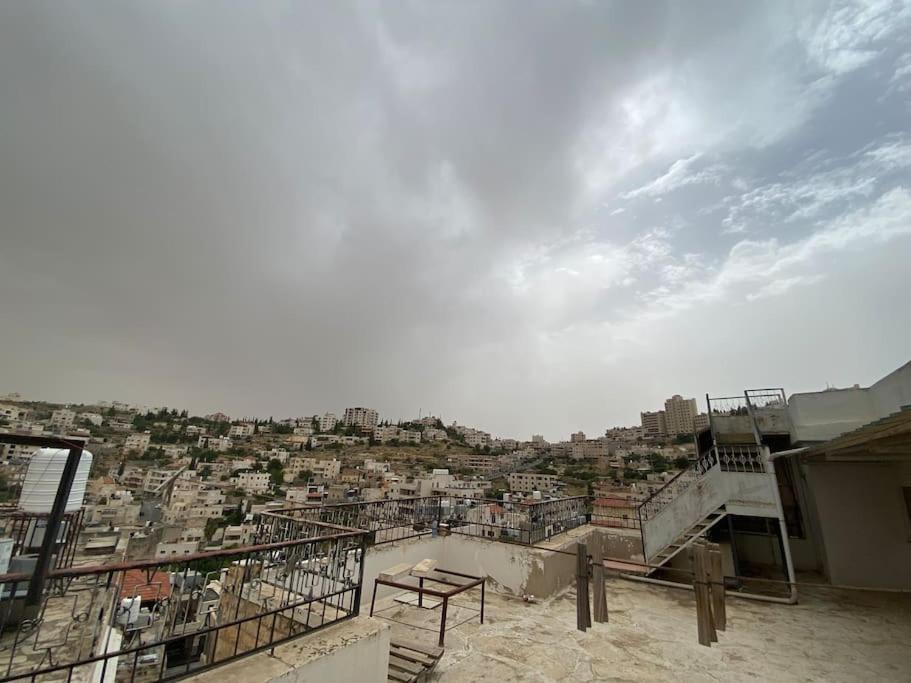 a view of a city from the top of a building at Traditional Palestinian Home in Beit Sahour