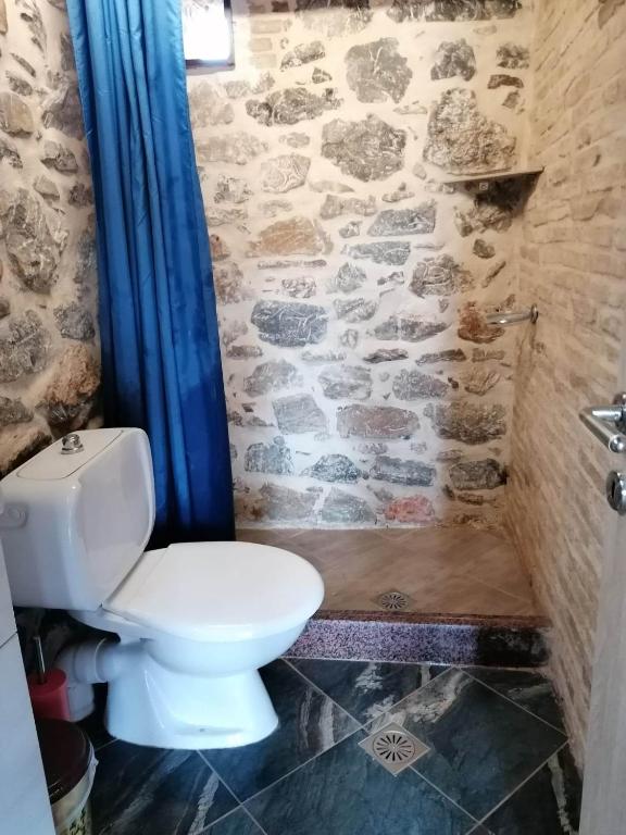 A bathroom at panos stone tower