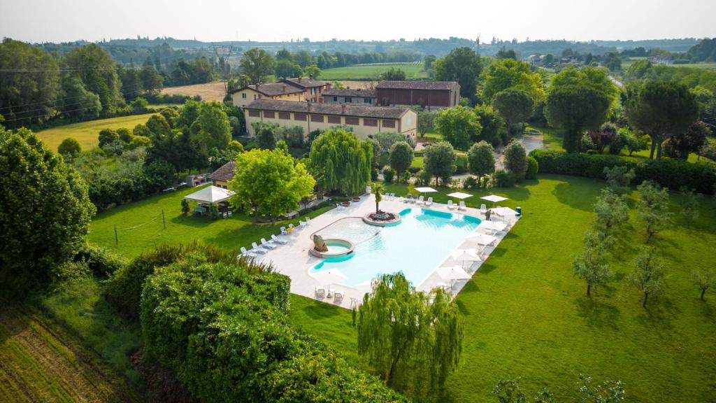 an aerial view of a estate with a swimming pool at Agriturismo Corte Salandini in Ponti Sul Mincio