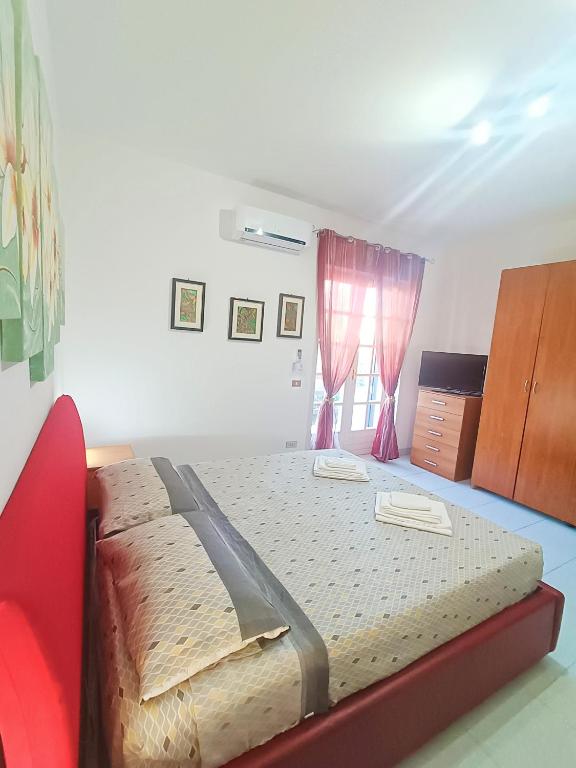 Postel nebo postele na pokoji v ubytování Salento Apartment