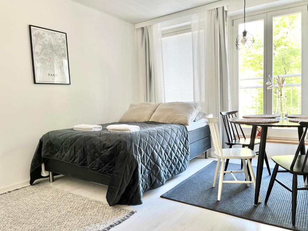 Postel nebo postele na pokoji v ubytování City Home Finland Downtown Suite- Perfect location & Great Amenities