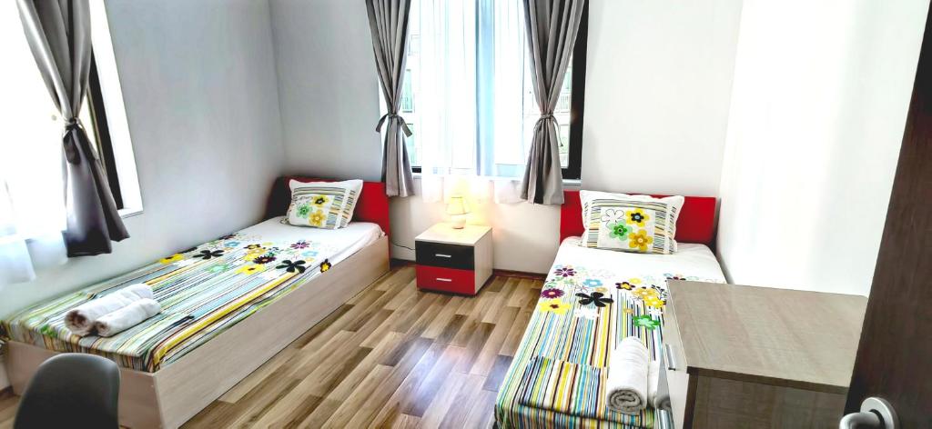 Postel nebo postele na pokoji v ubytování Family Apartments Amadeus lux