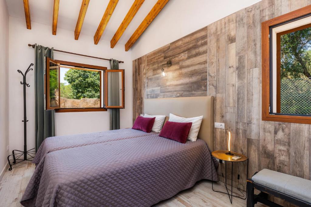 Postel nebo postele na pokoji v ubytování Villa Maria