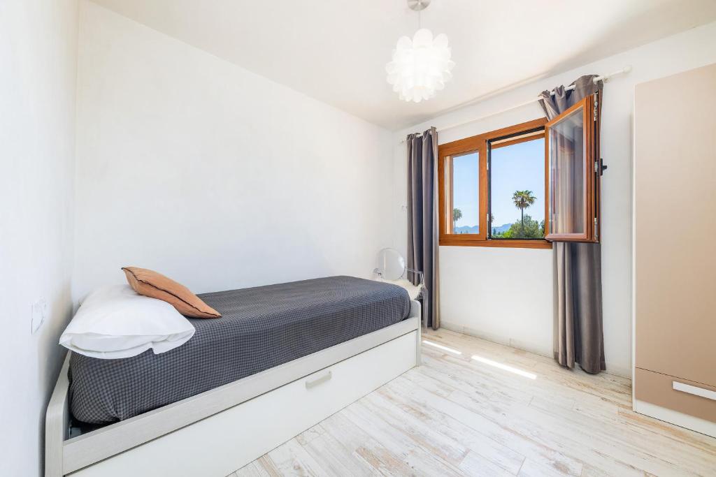 Postel nebo postele na pokoji v ubytování Villa Maria
