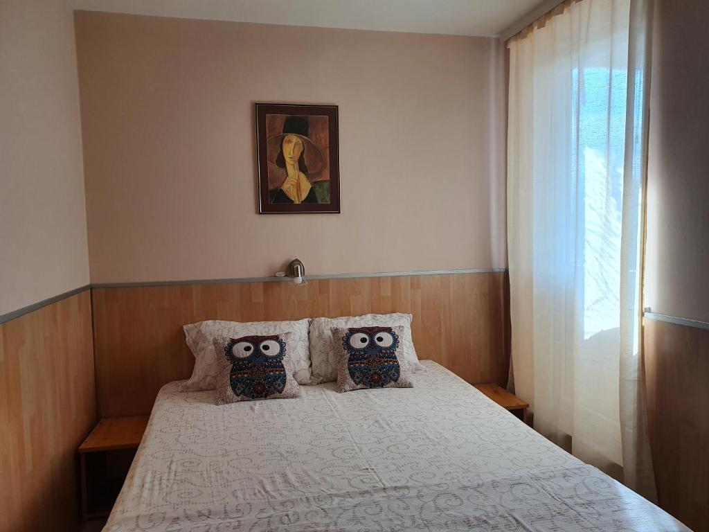 Postel nebo postele na pokoji v ubytování Malgo