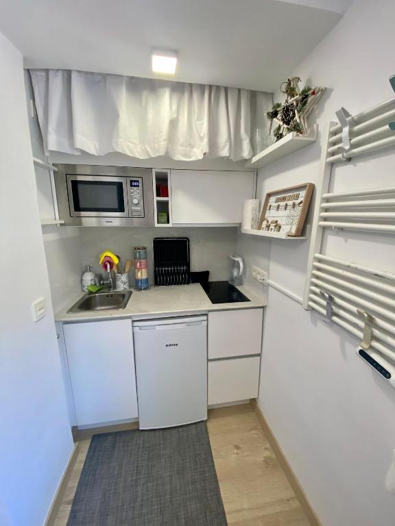 Kuchyň nebo kuchyňský kout v ubytování SAINT MORITZ PREMIUM