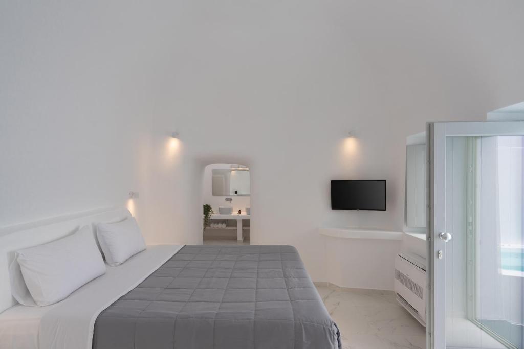 Postel nebo postele na pokoji v ubytování White Concept Caves