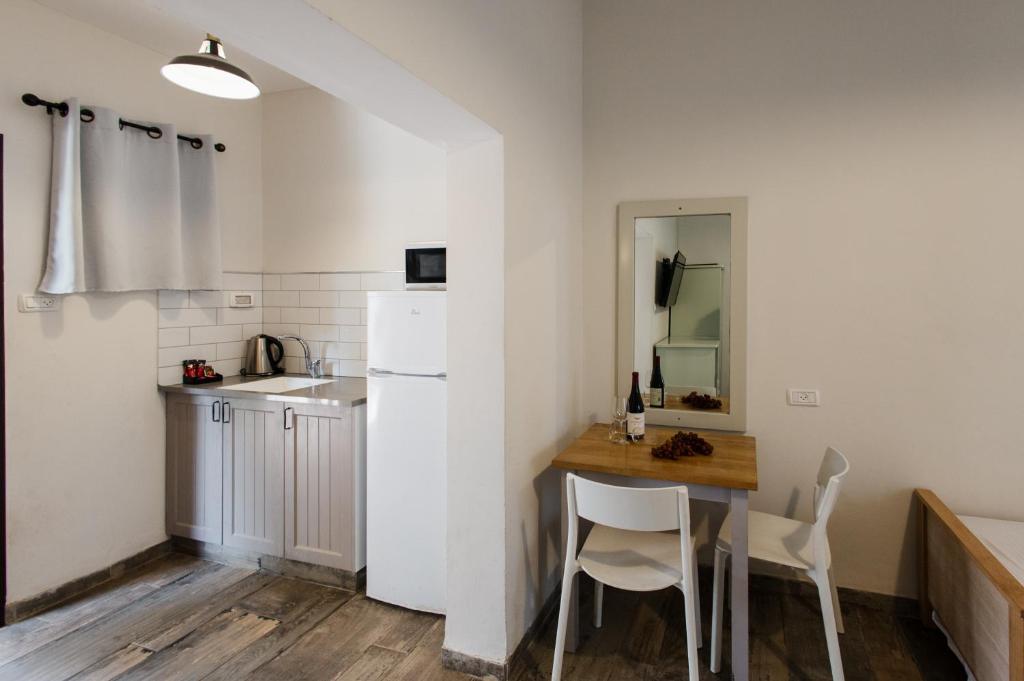 Kuchyň nebo kuchyňský kout v ubytování כפר הנופש קיבוץ גדות Kibbutz Gadot Galilean Resort