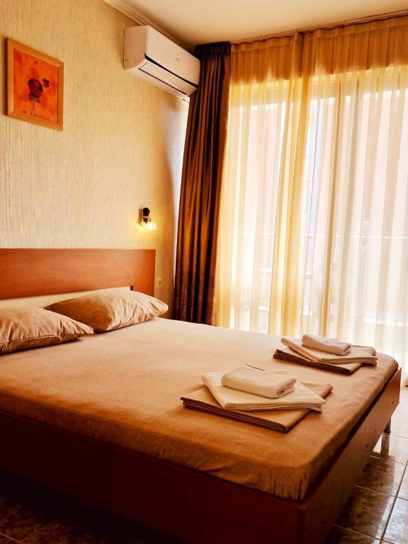 Postel nebo postele na pokoji v ubytování Къща за гости Карел