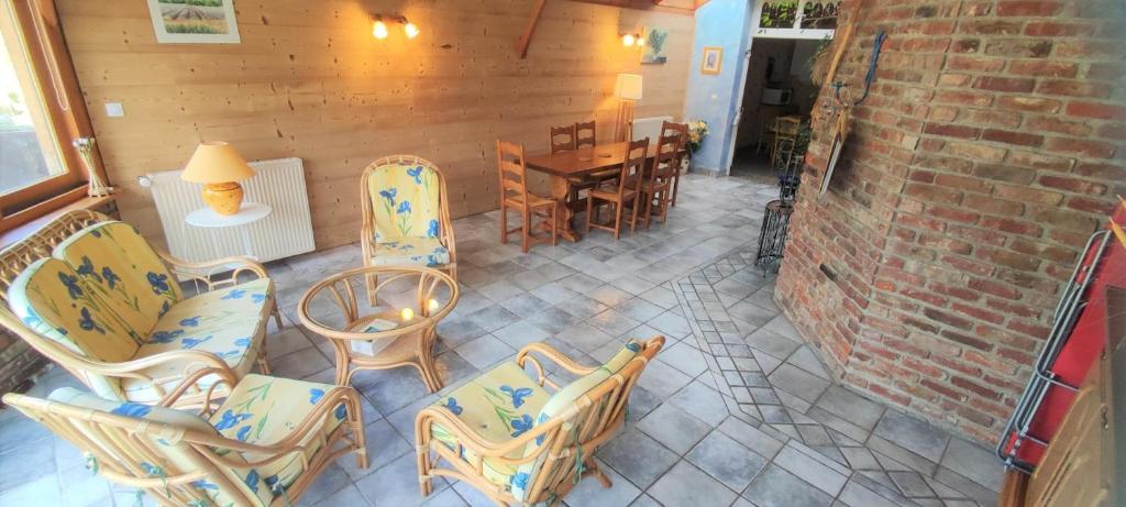 an overhead view of a patio with chairs and a table at L'esperance in Haybes