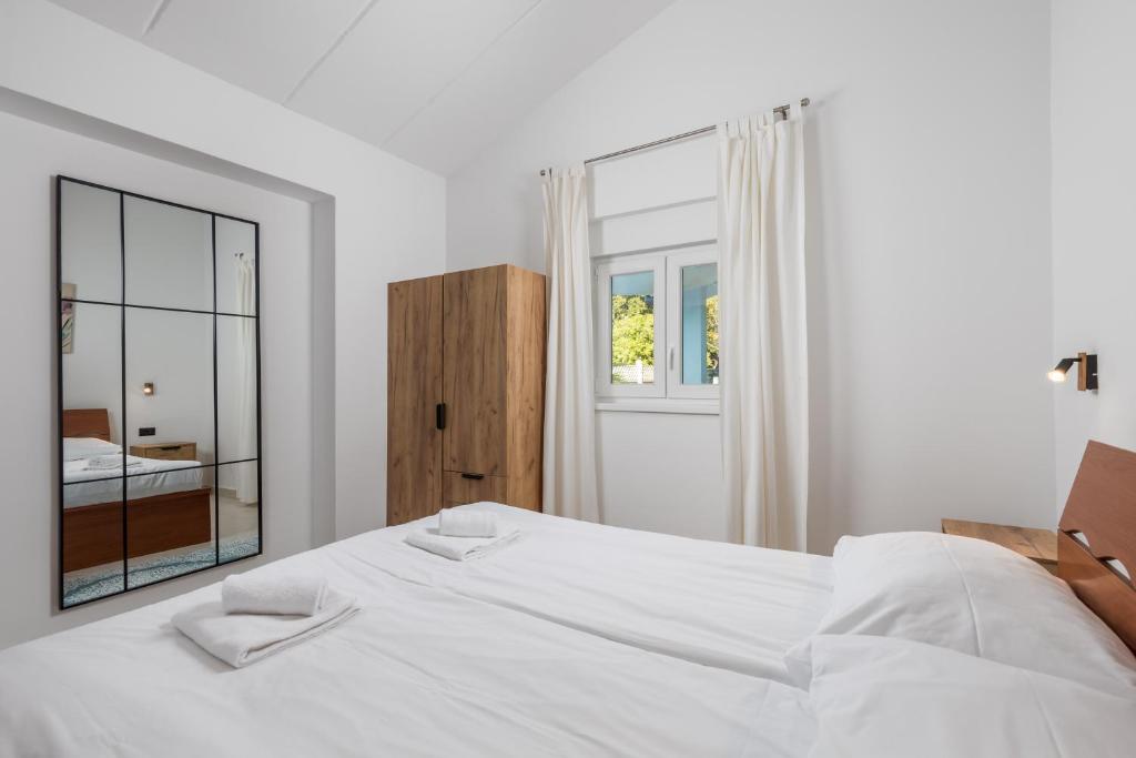 Łóżko lub łóżka w pokoju w obiekcie Rona apartment Janja