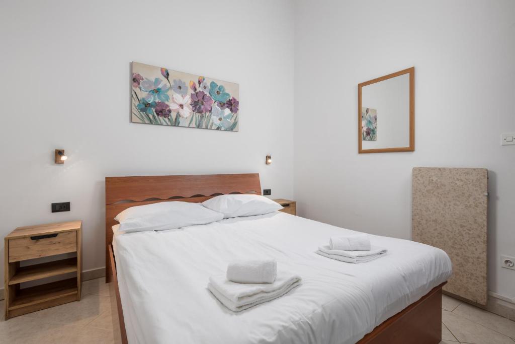 Łóżko lub łóżka w pokoju w obiekcie Rona apartment Janja