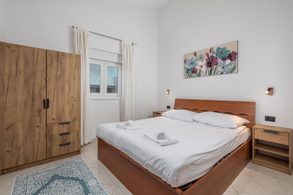 Łóżko lub łóżka w pokoju w obiekcie Rona apartment Janja