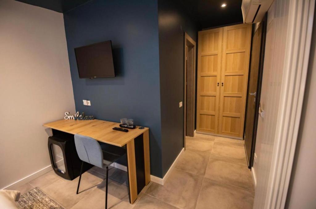 TV a/nebo společenská místnost v ubytování Casa Doner Rooms