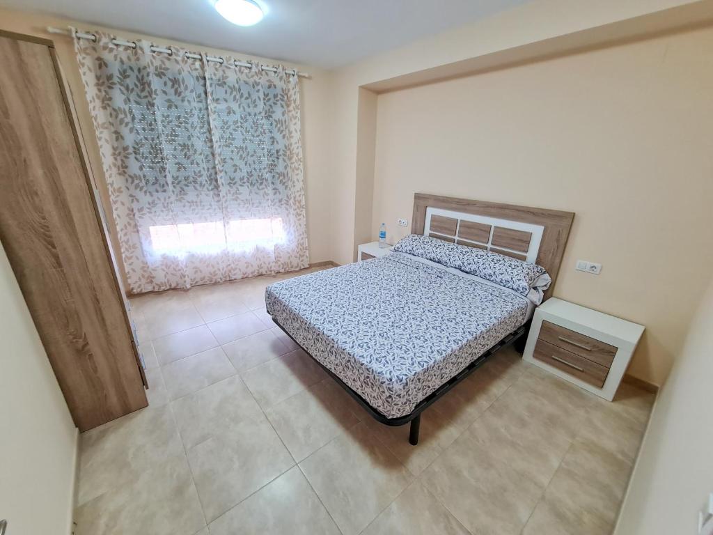 Postel nebo postele na pokoji v ubytování Las Jarcias 3A