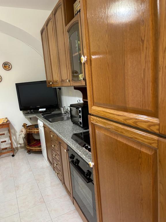 A kitchen or kitchenette at La Minicasa