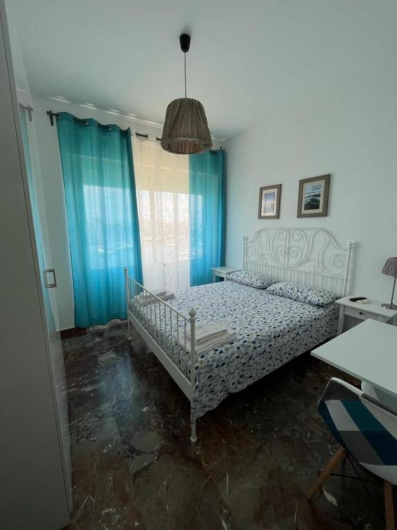 Postel nebo postele na pokoji v ubytování Ortigia D'amare