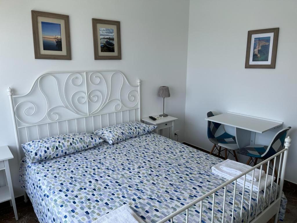Postel nebo postele na pokoji v ubytování Ortigia D'amare