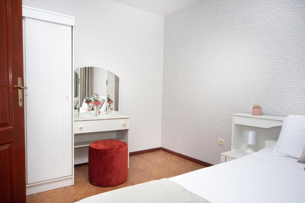 Кровать или кровати в номере Apartments Adeona