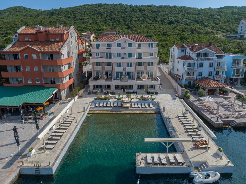 an aerial view of a marina in a city at Apartments Adeona in Tivat