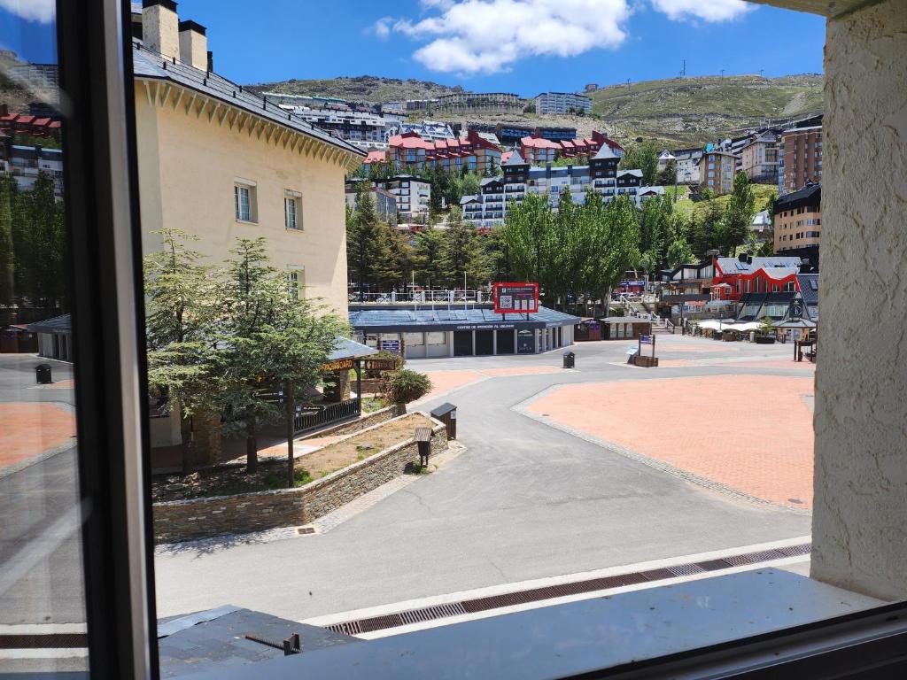 a view of a city from a window at dornajo en la plaza in Sierra Nevada