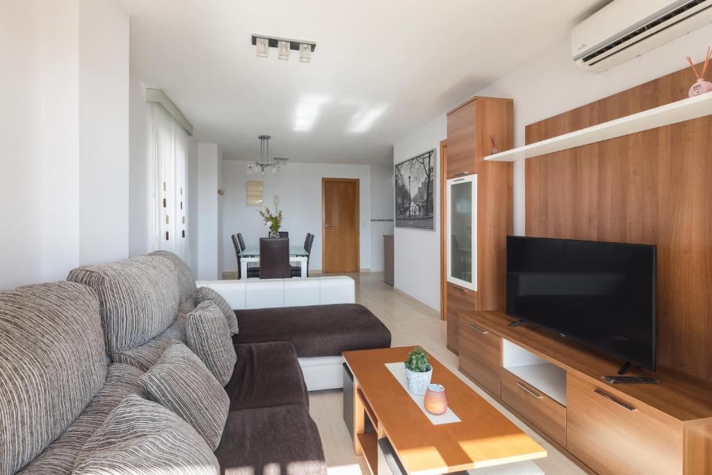 TV a/nebo společenská místnost v ubytování Apartamento Clayma