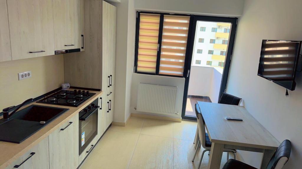 Kuchyň nebo kuchyňský kout v ubytování YES HOME ERK