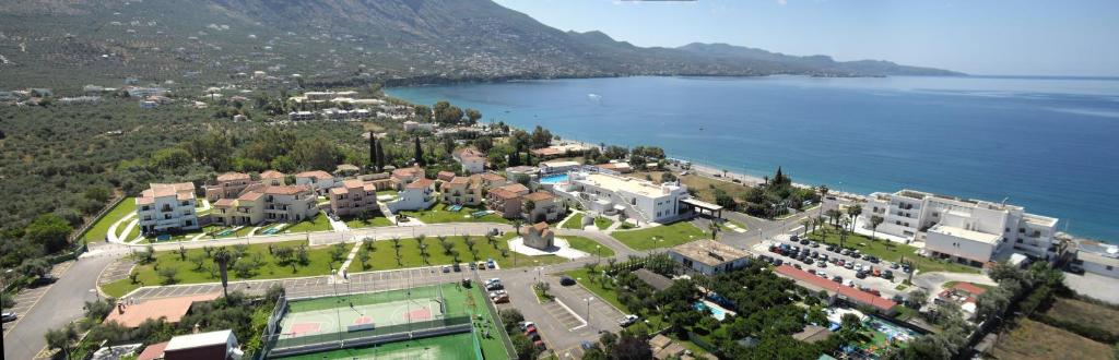 an aerial view of a town next to the water at Elite City Resort in Kalamata