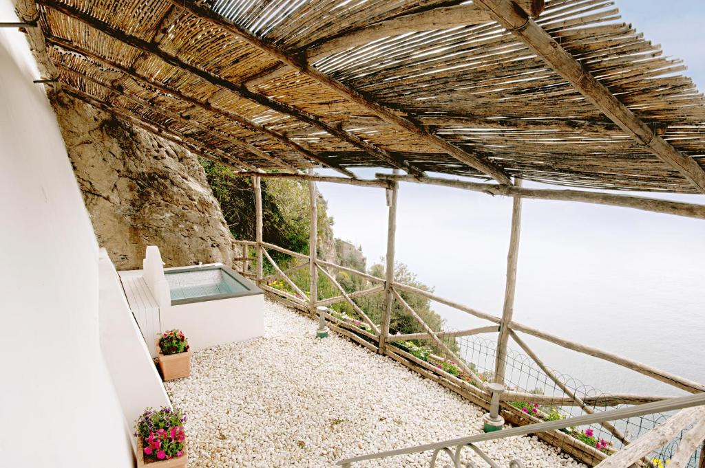 a room with a view of the water at Hotel Villa Pandora in Maiori