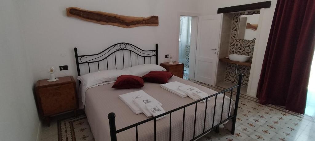 Postel nebo postele na pokoji v ubytování Le Scale di Pietra