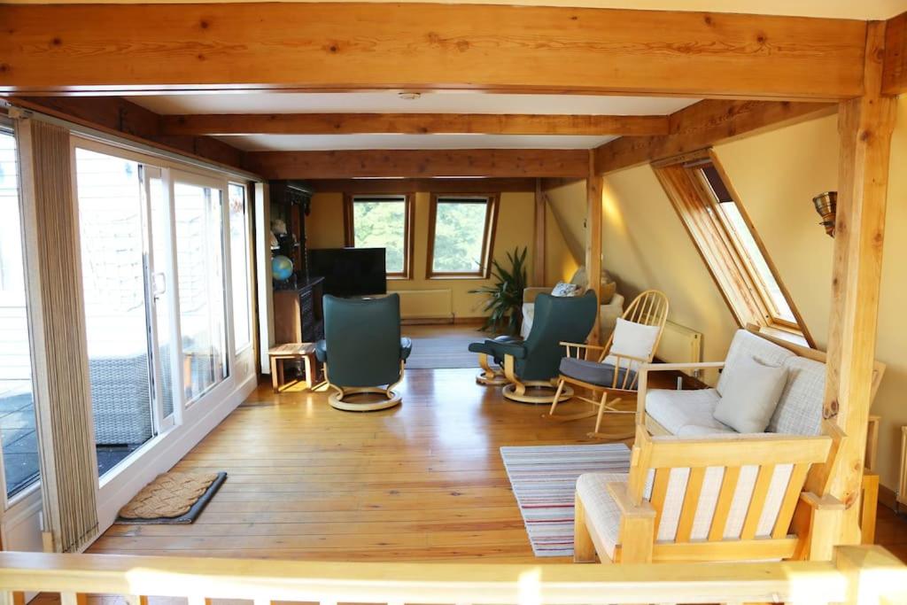 a living room with a couch and chairs at Unique 2BD Apartment Folkestone Harbour in Kent