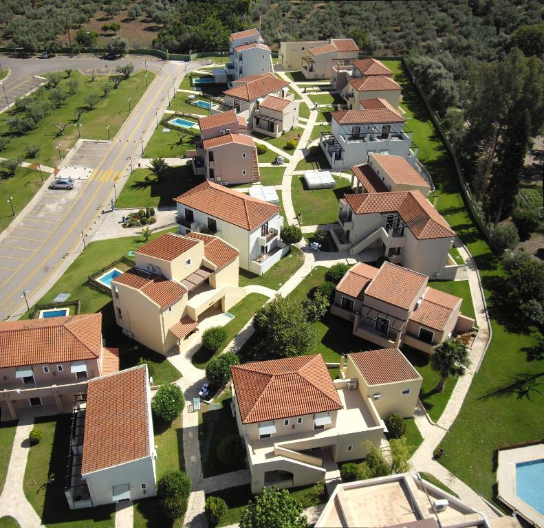 an overhead view of a row of houses with roofs at Elite City Resort in Kalamata