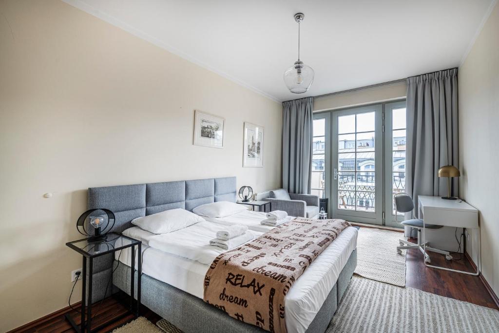 מיטה או מיטות בחדר ב-Lapwing Apartments Monte Cassino