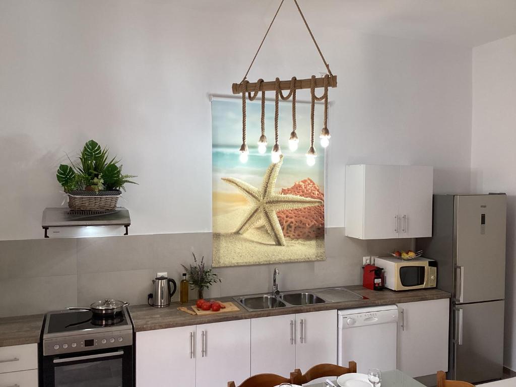 Kuchyňa alebo kuchynka v ubytovaní Landro House