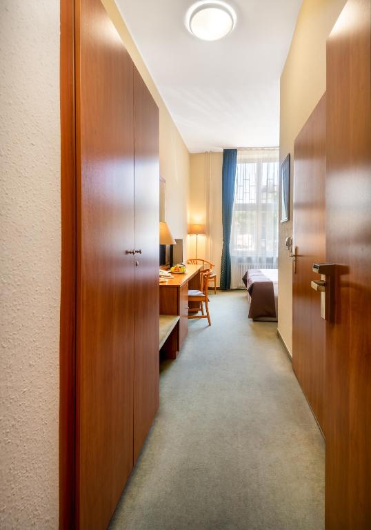 Posteľ alebo postele v izbe v ubytovaní Hotel Millennium