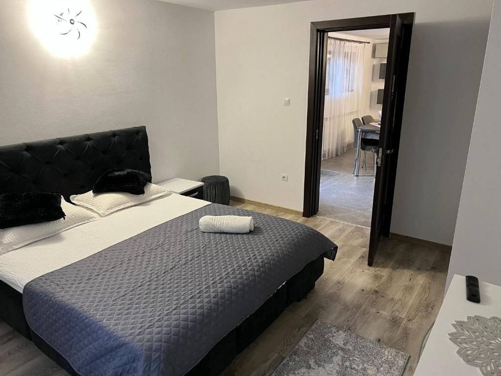 Postel nebo postele na pokoji v ubytování Casa Cernat