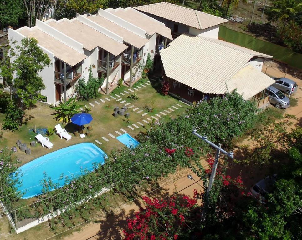 an aerial view of a house with a swimming pool at Albacora Eco Residence in Imbassai