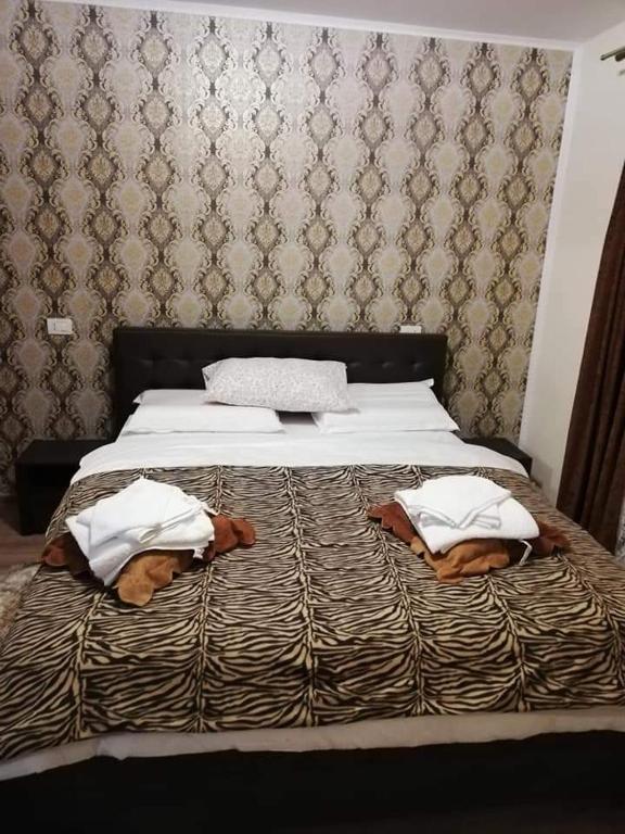 Postel nebo postele na pokoji v ubytování Casa Brănescu