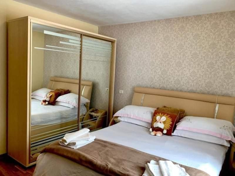 Postel nebo postele na pokoji v ubytování Casa Brănescu