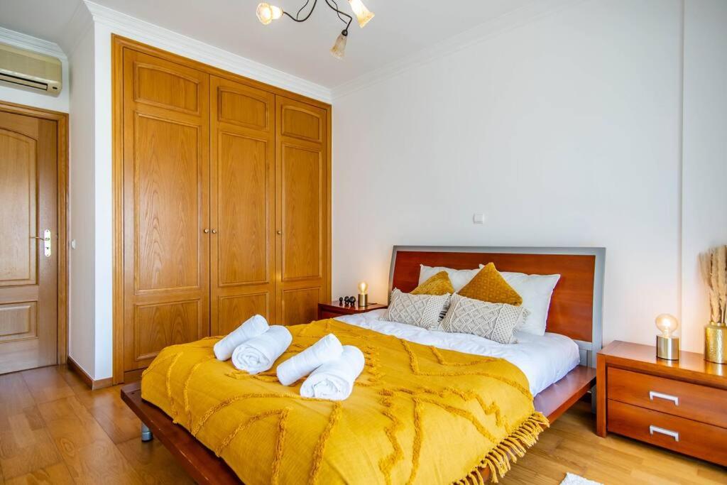 Кровать или кровати в номере Casa Encosta da Marina