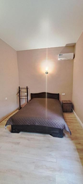 Postel nebo postele na pokoji v ubytování RiverSide Hostel Borjomi