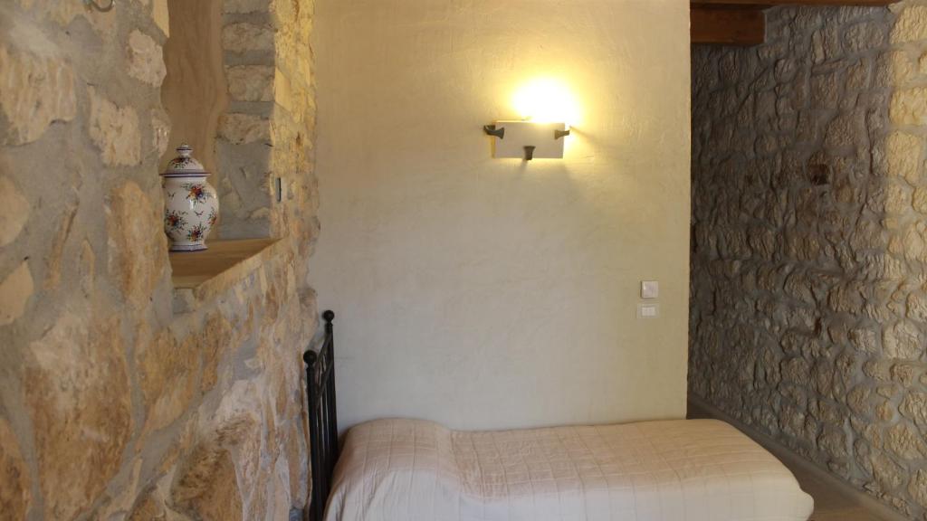 Posteľ alebo postele v izbe v ubytovaní B&B Lo Gnomo