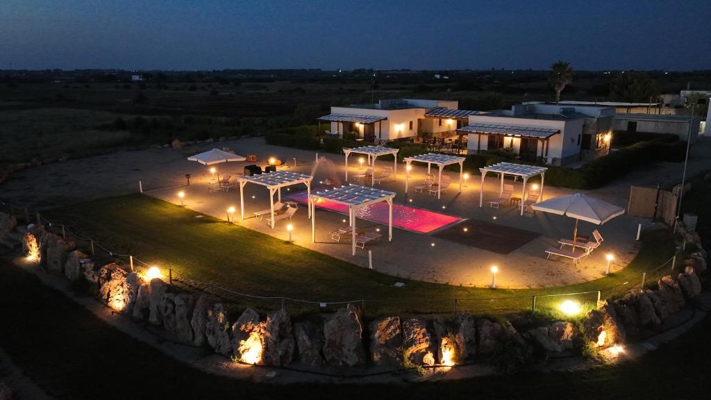 an aerial view of a building at night with lights at Il giardino dei tramonti in Nardò