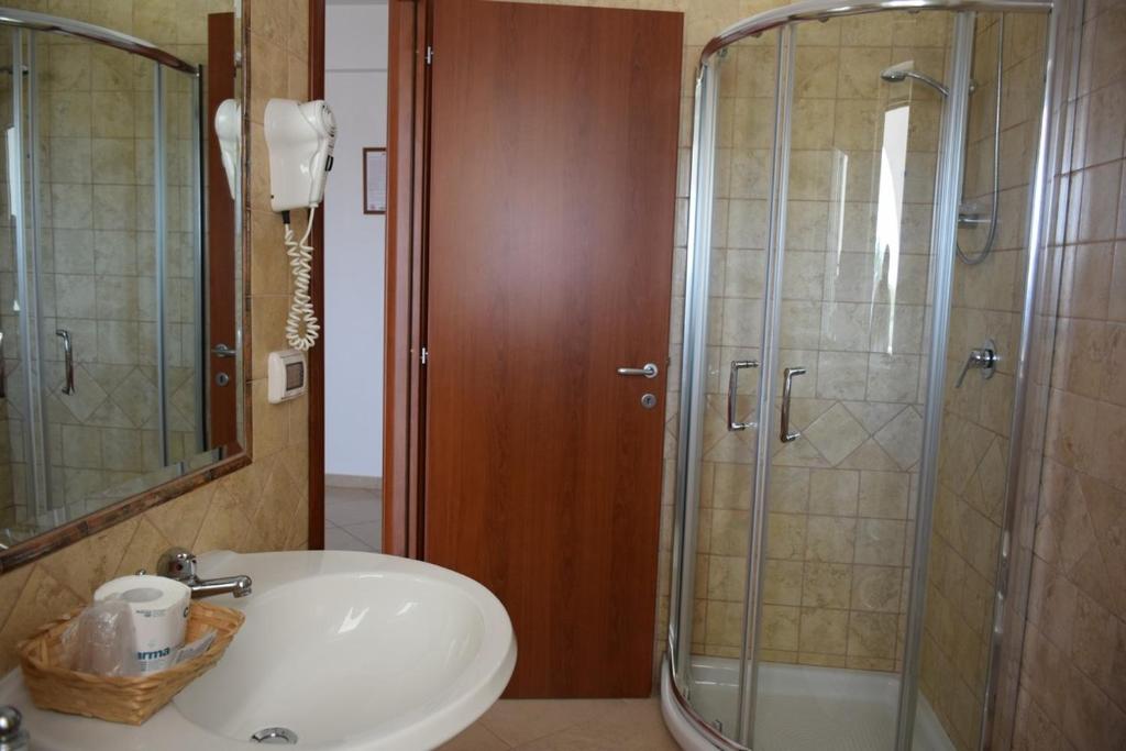 Koupelna v ubytování Hotel Maggiore