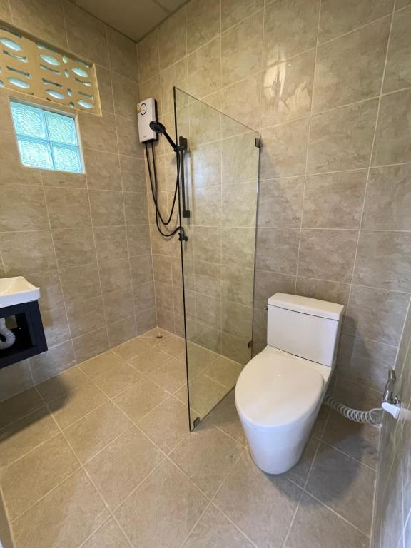 Koupelna v ubytování Mythai Guesthouse