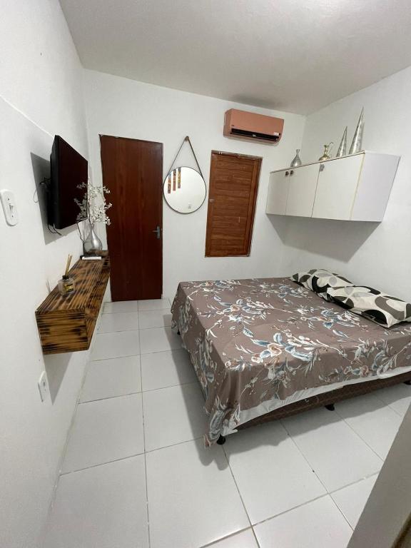Suíte aconchegante a dois passos da praia - Housity